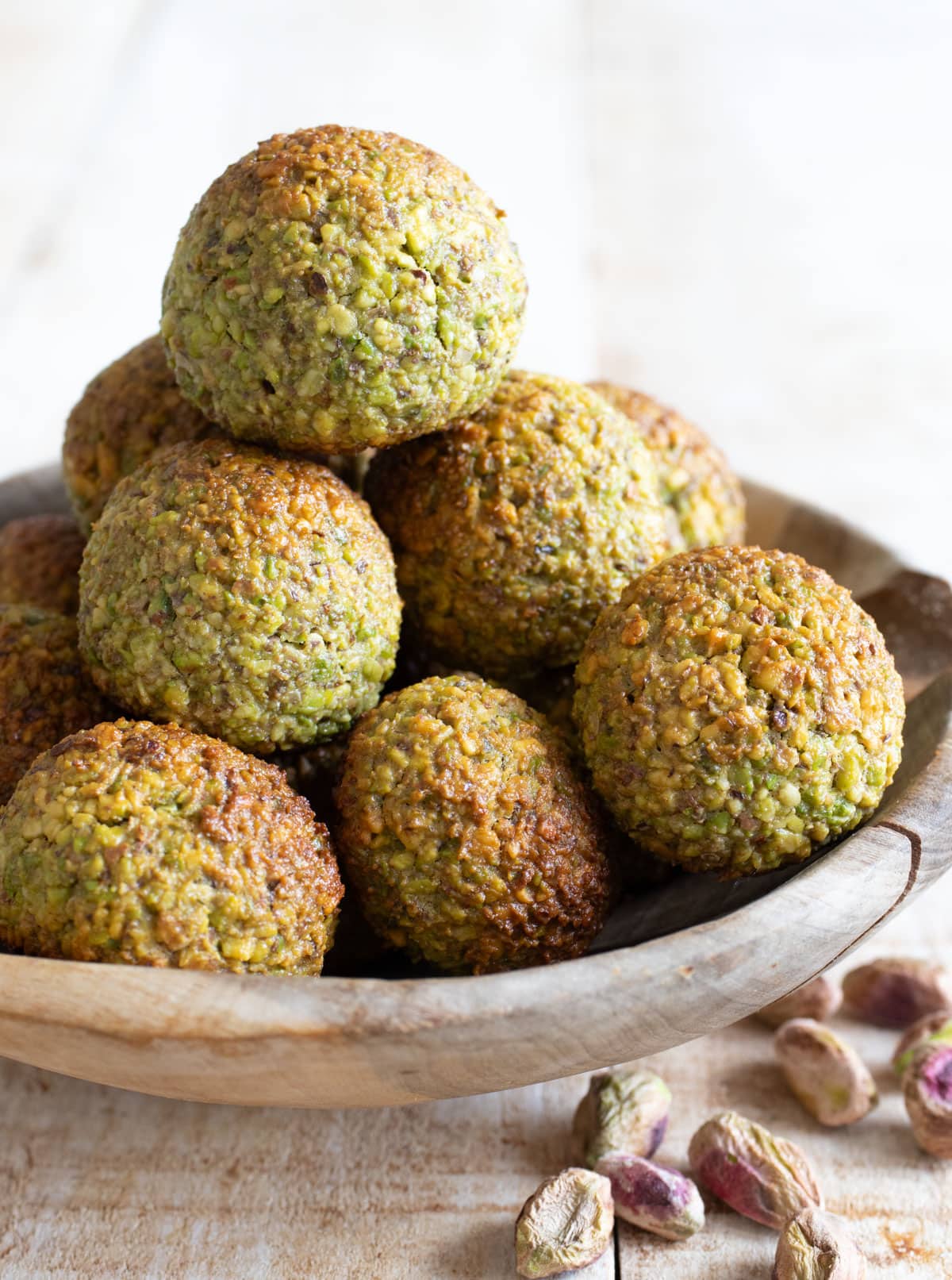 Keto pistachio cookies in a bowl.