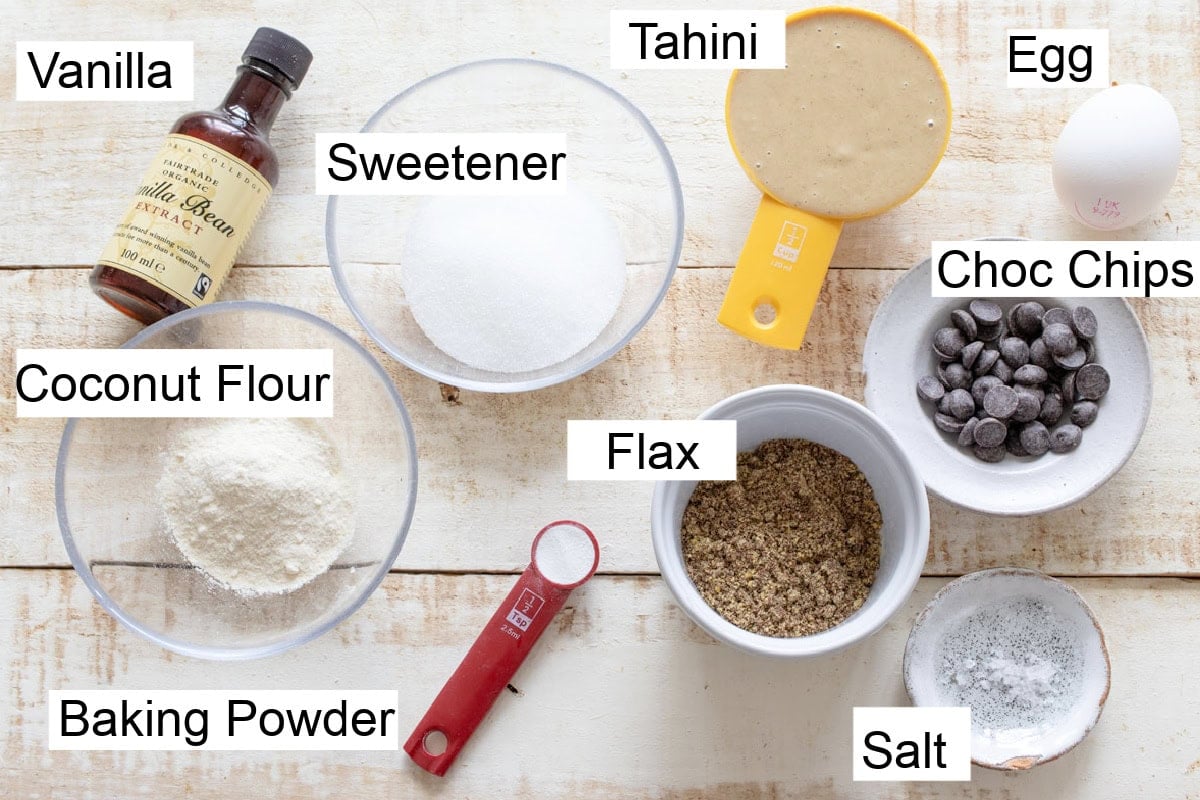 Ingedients to make keto tahini cookies, measured into bowls and labelled.