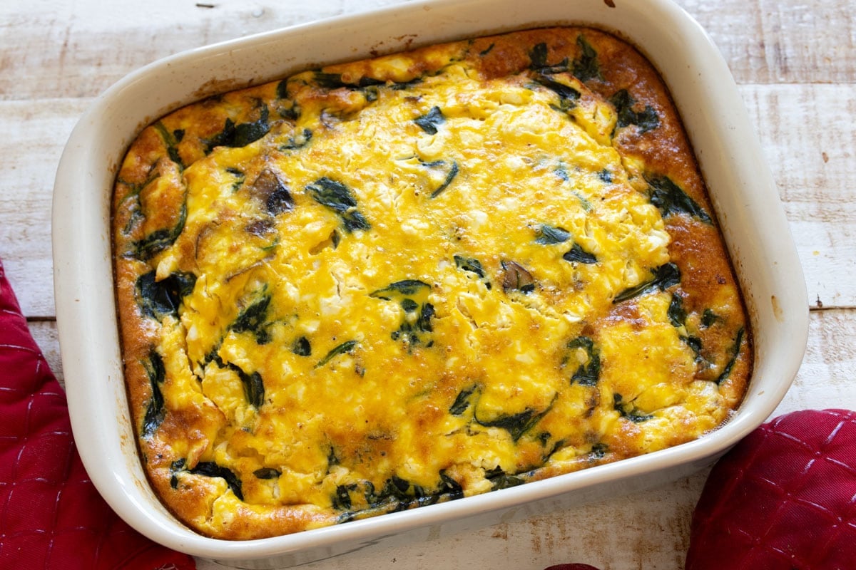 Cottage cheese egg bake after baking, with a puffed up middle and golden edges.