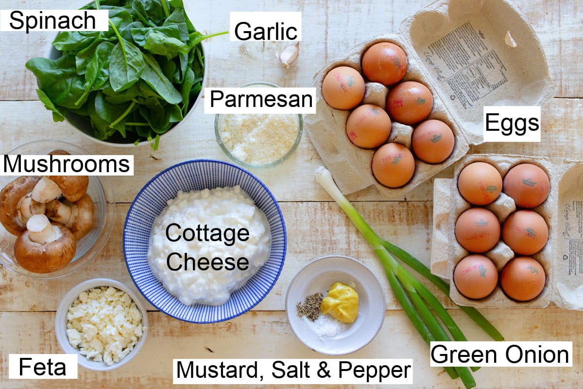 Ingredients to make a cottage cheese egg bake, measured into bowls and labelled.