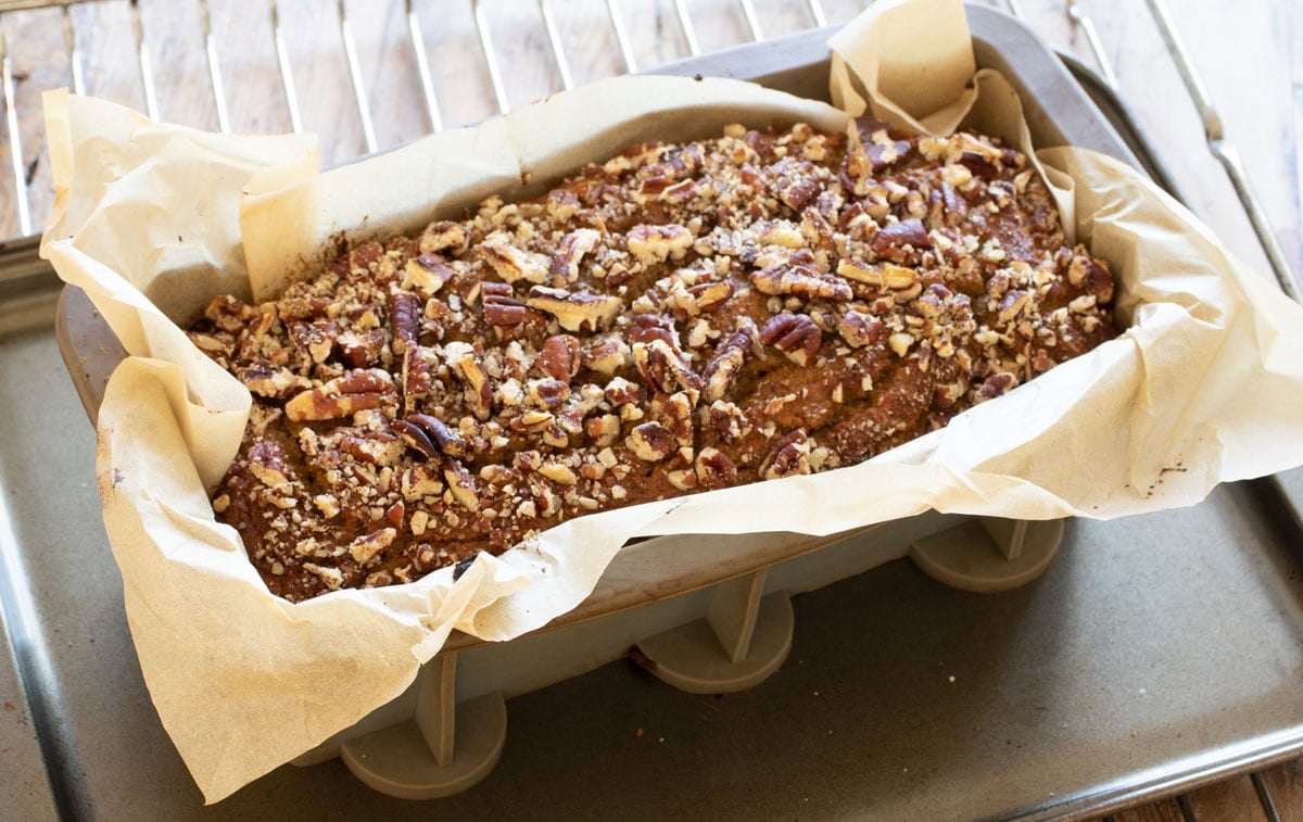 The baked banana bread in the loaf pan.