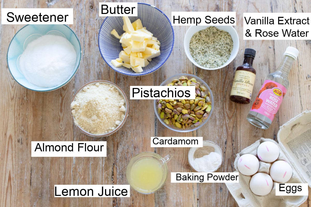 Ingredients to make keto pistachio cake, measured into bowls and labelled.